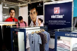 A booth of a Vietnamese garment company at the fair (Photo: VNA)