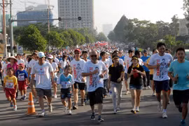 Runners of the 18th Terry Fox Run (Photo: VNA)