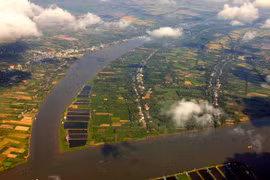 The Hau River runs through An Giang and Dong Thap provinces (Photo: VNA)