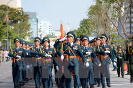 Vietnamese armed forces parade through Nguyen Hue street in District 1, Ho Chi Minh City (Photo: VNA) 