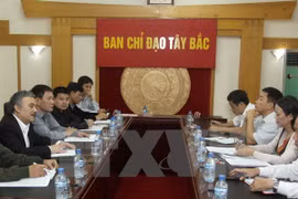 A view of the working session. (Photo: VNA)