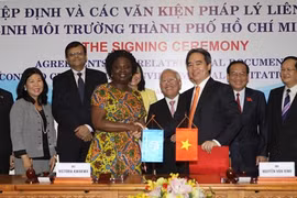 The State Bank of Viet Nam and the World Bank yesterday signed agreements for a total of 450 million USD worth of loans to further improve HCM City's environment and sanitation. (Photo: VNA)