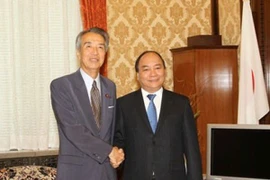 Deputy Prime Minister Nguyen Xuan Phuc (R) meets with Speaker of the House of Representatives of Japan Ibuki Bunmei. Photo: VNA