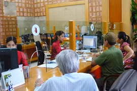 Transaction at Agribank (Photo: VNA)