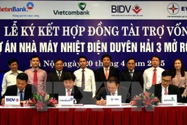At the signing ceremony (Photo: VNA)