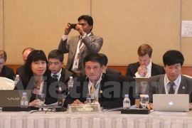Deputy Minister of Information and Communications Pham Hong Hai (front, middle) attended the event (Photo: VNA) 