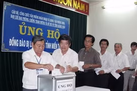 Flood victims get more foreign, domestic aid 