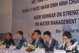 Deputy Prime Minister Pham Binh Minh (centre) at the event (Photo: VNA)