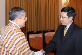 Foreign Minister Pham Binh Minh receives Lyonpo Kinzang Dorji (Source: VNA)