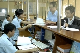 Import and export firms will begin phasing in the use of digital signatures for the e-customs system this year (Source: VNA)