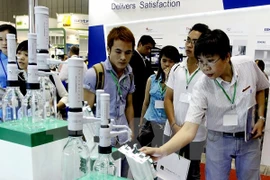 Visitors at the Analytica Vietnam 2014 (Photo: VNA)