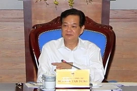 PM Nguyen Tan Dung addresses the meeting. Photo: VNA
