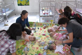 A month-long campaign for the prevention of mother-to-baby transmission of HIV (MTCT) will be launched in June (Photo:VNA)