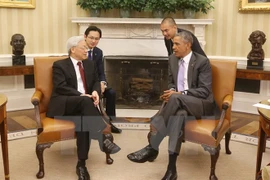 Party General Secretary Nguyen Phu Trong (L) talks with US President Barack Obama (Photo: VNA)