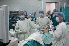 Doctors operate a surgery at Cho Ray Hospital. Photo: VNA