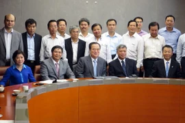 Officials at the session on August 20 (Photo: VNA)