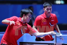 Vietnamese duo Tuan Quynh and Anh Tu at the semi-final match. (Photo: VNA)