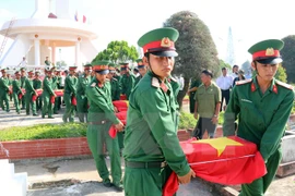 The southern province of Kien Giang also organised a ceremony to rebury the remains of 49 volunteer Vietnamese soldiers and experts who died in Cambodia. Photo: VNA