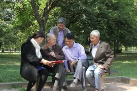 The Vietnamese documentary makers meet with Pierre Bonny, a former French soldier who was in the Indochina war (Photo courtesy of film crew)