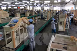 Assembly line of exported woodwork products. Photo: VNA