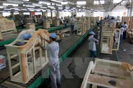 Assembly line of exported woodwork products. Photo: VNA