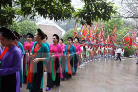 Participants at the ceremony to pay tribute to the Hung Kings in 2014 (Photo: VNA)