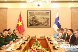 Senior Lieut.Gen. Truong Quang Khanh received Finnish Minister of Economic Affairs Jan Vapaavuori on October 20 (Source: VNA)