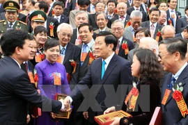 President Truong Tan Sang meets with outstanding health workers (Photo: VNA)
