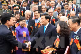 President Truong Tan Sang meets with outstanding health workers (Photo: VNA)