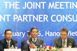 Minister of Natural Resources and Environment Nguyen Minh Quang at the meeting (Photo:VNA)