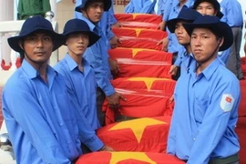 Southern Kien Giang province holds a reburial ceremony for remains of soldiers fallen in Cambodia (Source: VNA)