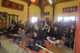 Buddhist followers at the requiem (Photo: VNA)