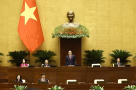 NA Chairman Tran Thanh Man (standing) and NA Vice Chairpersons at the opening ceremony of the 8th session of the 15-tenure National Assembly in Hanoi on October 21. (Photo: VNA)