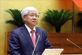 President of the Vietnam Fatherland Front (VFF) Central Committee Do Van Chien delivers a report at the NA's seventh session. (Photo: VNA)