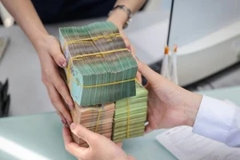 Fintech companies bring hope to small and micro enterprises that are thirsty for capital as they provide alternative lending solutions thanks to their advantages in technology and data. (Photo vnbusiness.vn) 