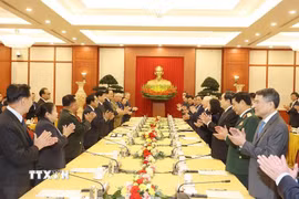 Top leaders of Vietnamese, Lao Parties meet in Hanoi