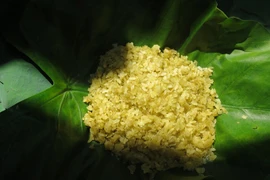 Hanoians fete young rice flakes