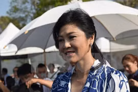 Ex-Thai premier appears in court over rice subsidy scheme