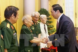 State leader hails contributions by former volunteers in Laos