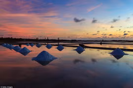 Vietnam’s salt fields in top most breathtaking sunsets on earth