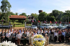 Incense offered at Laos-Vietnam martyr cemetery in Laos