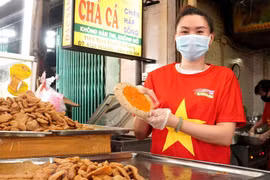 Market vendors in Da Nang show determination to win COVID-19 fight