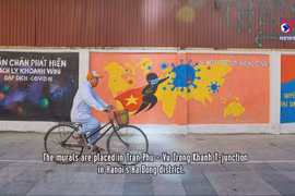 Murals in Hanoi convey message of fighting Covid-19