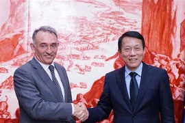 Minister of Public Security General Luong Tam Quang (right) meets with Secretary-General of the Communist Party of Spain (PCE) Enrique Fernando Santiago Romero. (Source: VNA)