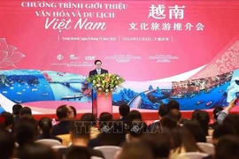 Prime Minister Pham Minh Chinh speaks at a programme introducing Vietnam’s culture and tourism in Chongqing city on November 8. (Photo: VNA)