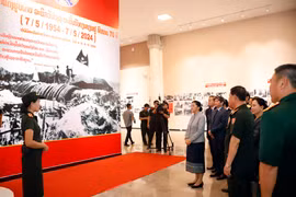 People at the exhibition. (Photo: VNA)