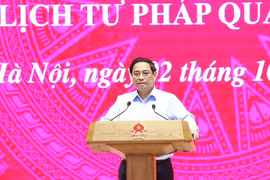 Prime Minister Pham Minh Chinh speaks at the online conference to implement the expansion of the electronic health record system and the issuance of judicial record certificates via the app VNeID nationwide. (Photo: VNA)