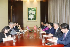 Vice Chairwoman of the National Assembly (NA) Nguyen Thi Thanh meets with her Armenian counterpart Hakob Arshakyan on October 19 in Vientiane. (Photo: VNA)