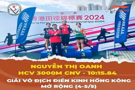 Nguyen Thi Oanh on the top podium of the Hong Kong Athletics Championship's women's 3,000m steeplechase on May 5. (Photo: Sports Authority of Vietnam)