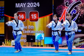 Chau Tuyet Van, Lien Thi Tuyet Mai and Nguyen Thi Le Kim (from left to right) top the podium of the 2024 Asian Taekwondo Championship's women's team T30 recognised poomsae category. (Photo courtesy of Taekwondo Vietnam) 